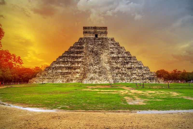 Chichen Itza pyramid at sunset Yucatan Mexico